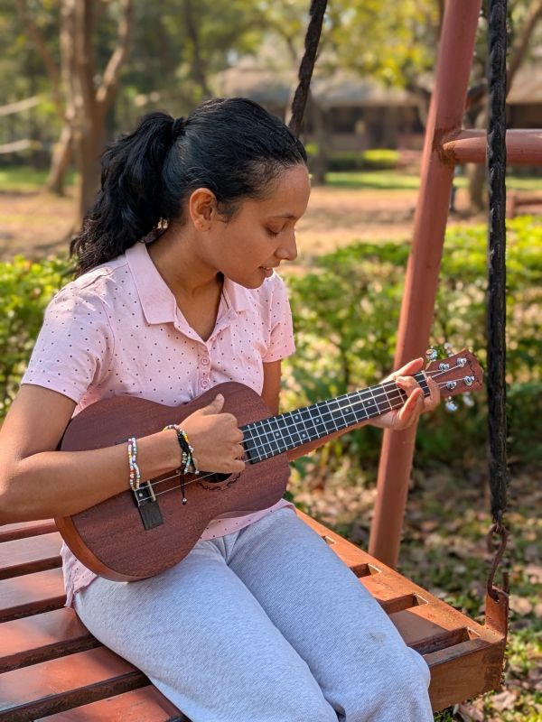 A girl with a ukulele